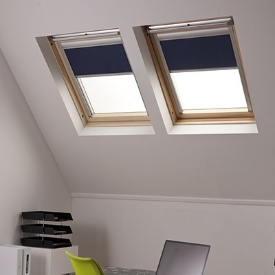Two Navy Skylight Blinds in roof windows side by side